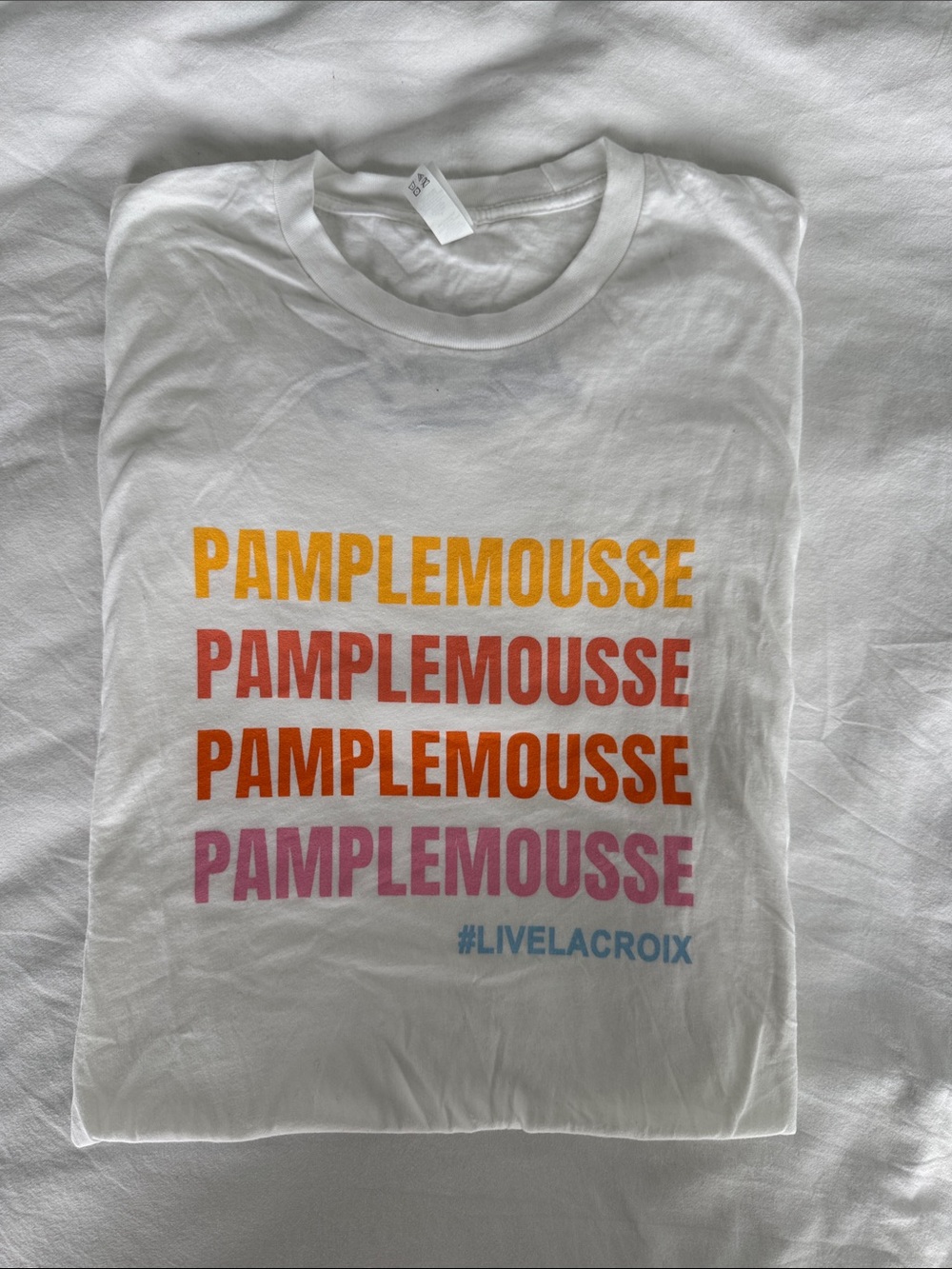 Next Level Apparel White T-Shirt with Yellow, Orange, Pink, Blue Print